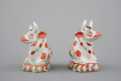A pair of petit feu polychrome Dutch Delft cows, 18th C.